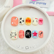 zb34..A collection of almond-shaped and square-shaped wearable nails