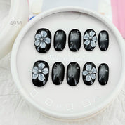 zb34..A collection of almond-shaped and square-shaped wearable nails