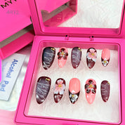 zb34..A collection of almond-shaped and square-shaped wearable nails