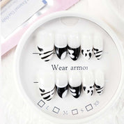 zb33..A variety of almond-shaped and square nails.