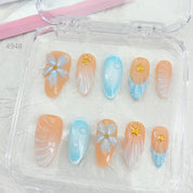 zb34..A collection of almond-shaped and square-shaped wearable nails