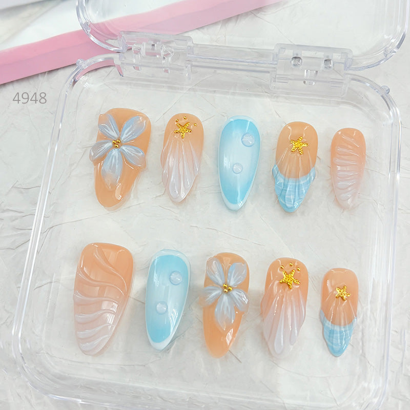zb34..A collection of almond-shaped and square-shaped wearable nails