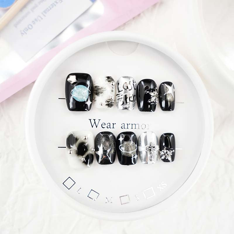 zb33..A variety of almond-shaped and square nails.