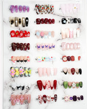 zb33..A variety of almond-shaped and square nails.